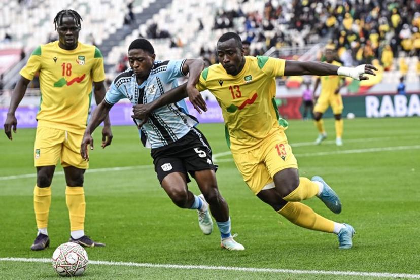 Botswana's defender #05 Alford Velaphi and  Benin's defender #13 Mohamed Tijani vie during the Africa Cup of Nations (CAN) Group D football match between Benin and Botswana at Rabat Olympic Stadium in Rabat on December 27, 2025.   Paul ELLIS / AFP