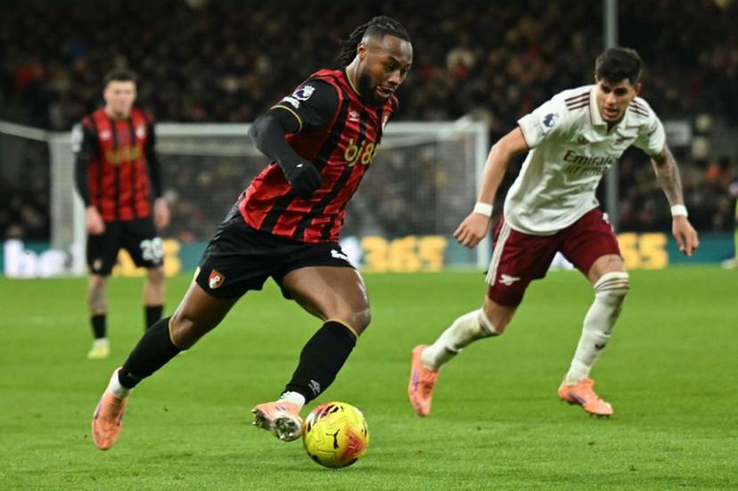 Bournemouth's Ghanaian striker #24 Antoine Semenyo (L) runs with the ball during the English Premier League football match between Bournemouth and Arsenal at the Vitality Stadium in Bournemouth, southern England on January 3, 2026.  JUSTIN TALLIS / AFP
