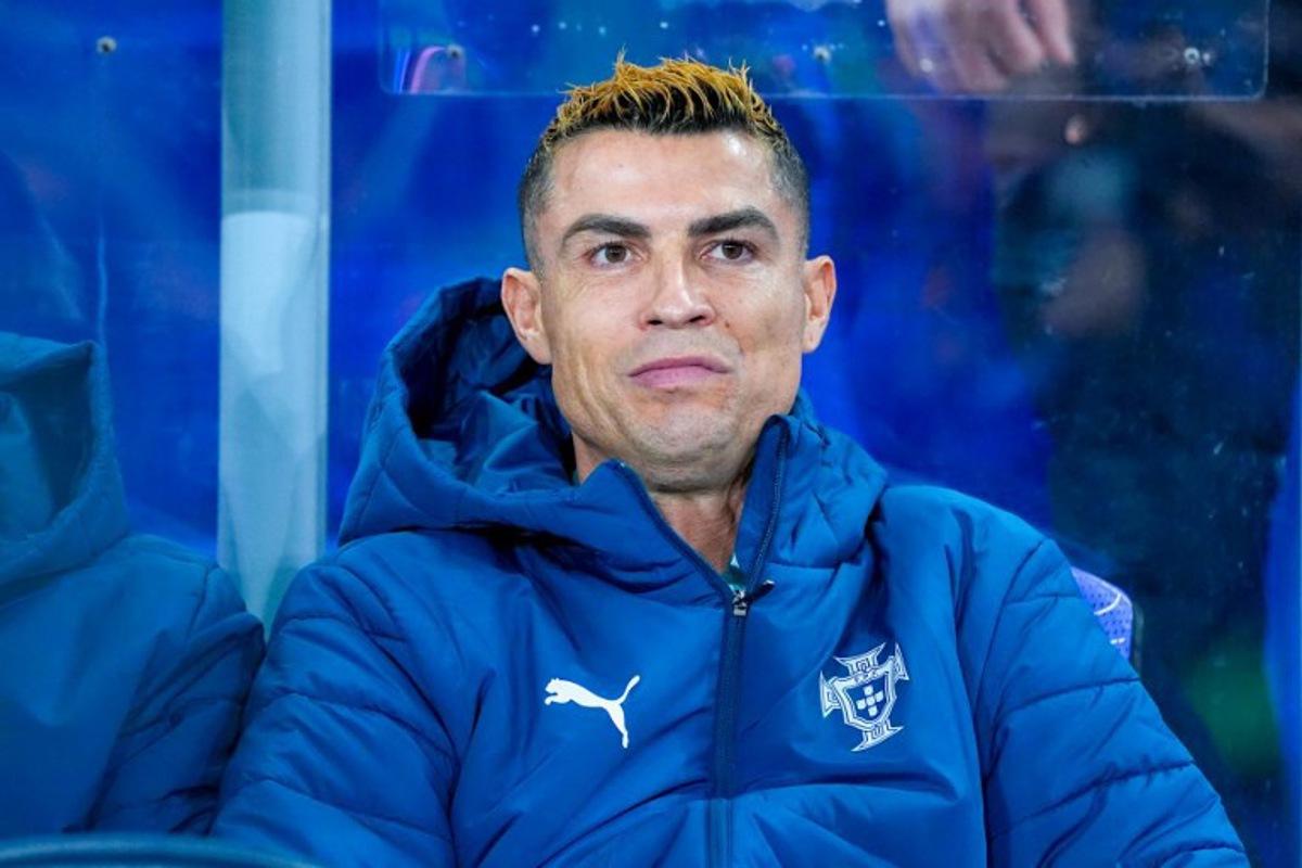 Portugal's forward #07 Cristiano Ronaldo sits on the bench ahead the UEFA Nations League Group A4 football match between Norway and Portugal in Oslo on September 27, 2026.  Lise Åserud / NTB / AFP