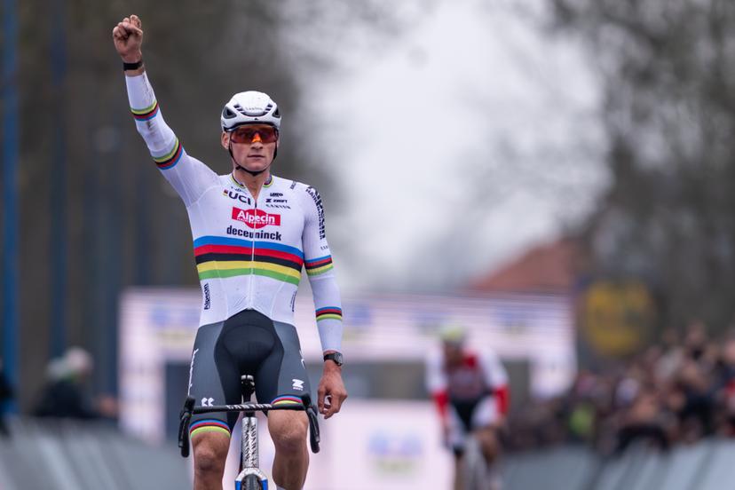Dutch Mathieu Van Der Poel celebrates as he crosses the finish line to win the men elite race at the 6th stage (out of 12) of the world cup cyclocross, in Koksijde Sunday 21 December 2025. BELGA PHOTO DAVID PINTENS