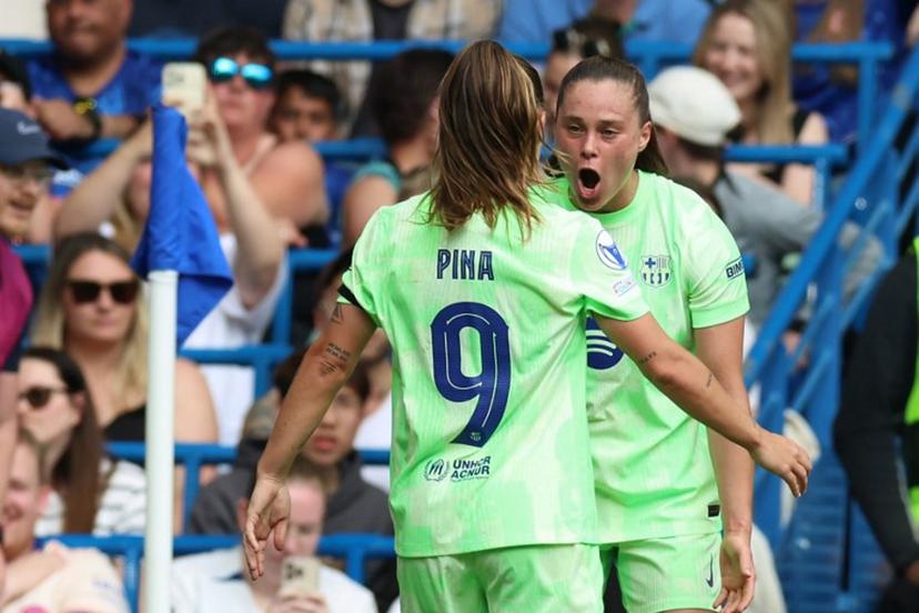Barcelona's Polish striker #17 Ewa Pajor (R) celebrates with Barcelona's Spanish striker #09 Claudia Pina (L) after scoring their second goal during the UEFA Women's Champions League league semi-final second leg football match between Chelsea and Barcelona at Stamford Bridge in London on April 27, 2025.  Darren Staples / AFP