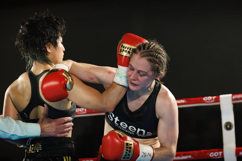 Belgian Delfine Persoon pictured in action during the fight between Belgian Delfine Persoon and Korean Bo Mi Re Shin, for the WBC Silver Super Feather title women title, Sunday 28 May 2023, in Torhout. BELGA PHOTO KURT DESPLENTER
