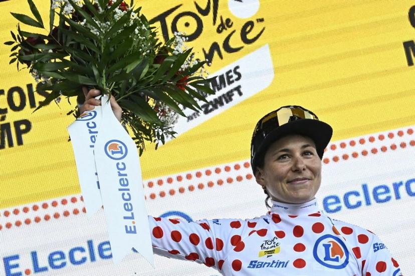 FDJ-SUEZ team's Swiss rider Elise Chabbey wearing the climber's dotted jersey celebrates on the podium after the 8th stage (out of 9) of the fourth edition of the Women's Tour de France cycling race, 111.9 km from Chambery to Saint-Francois-Longchamp, in Saint-François-Longchamp, south-eastern France on August 2, 2025.  JULIEN DE ROSA / AFP