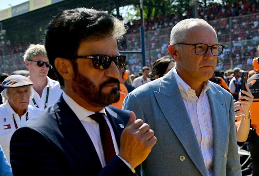 FIA President Mohammed Ben Sulayem (L) walks with Italian CEO of the Formula One Group Stefano Domenicali ahead of the Italian Formula One Grand Prix at the Autodromo Nazionale Monza circuit in Monza, northern Italy on September 6, 2026.  Andrej ISAKOVIC / AFP