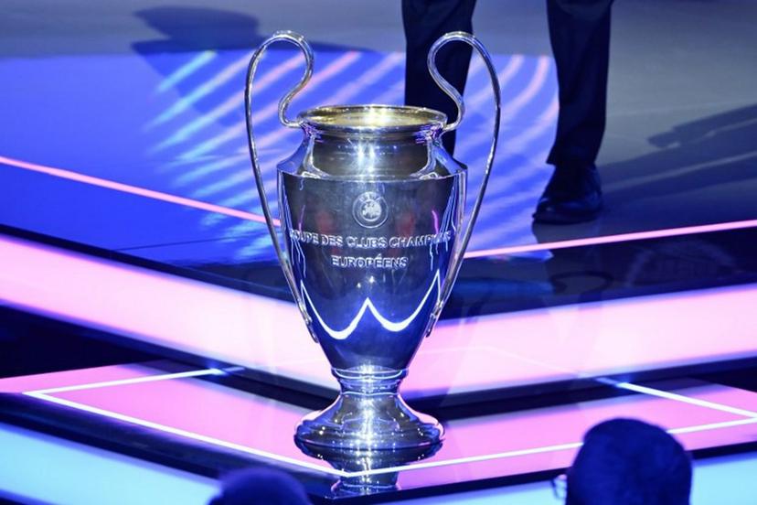 This photograph shows the UEFA Champions League trophy, before the draw for the group stage of the 2025-2026 UEFA Champions League football tournament, at the Grimaldi Forum in Monaco on August 28, 2025.  Frederic DIDES / AFP