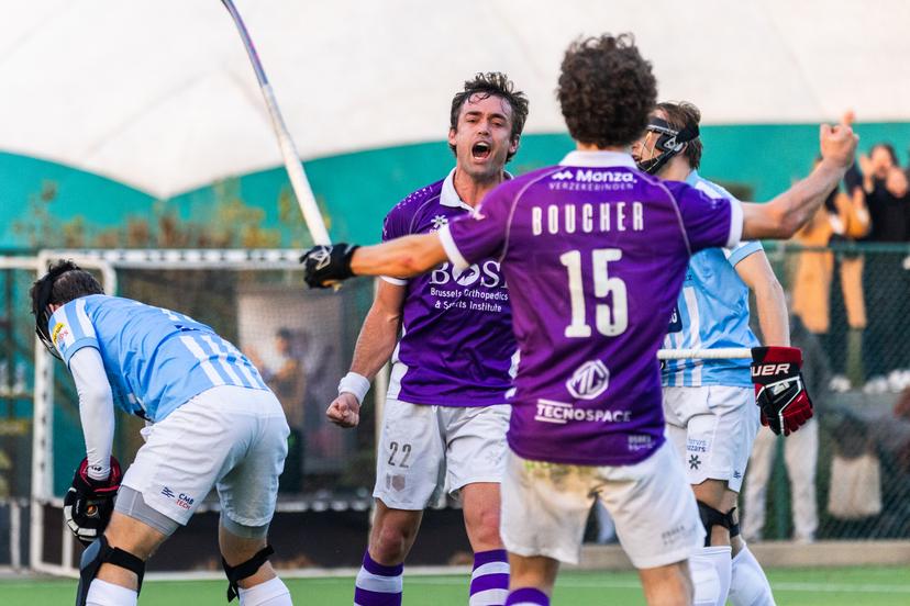 Beerschot's Daniel Bell (C) celebrates with Beerschot's  Julien Boucher at a hockey game between Beerschot and Gantoise, Sunday 09 November 2025 in Boussu, on day 10 of the Belgian first division hockey championship. BELGA PHOTO PAULINE SCHUMACKER