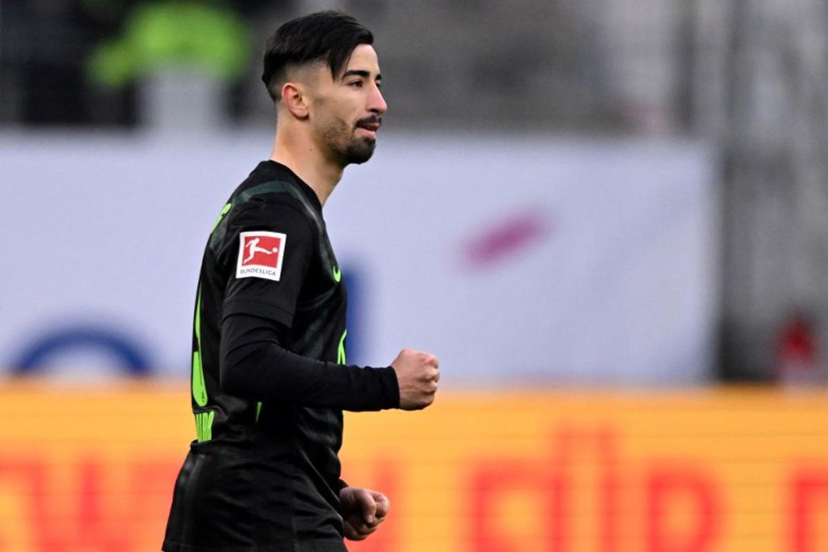 Wolfsburg's Algerian forward #09 Mohammed Amoura celebrates scoring 1-0 goal during the German first division Bundesliga football match Eintracht Frankfurt v VfL Wolfsburg in Frankfurt, on February 2, 2025.  Kirill KUDRYAVTSEV / AFP