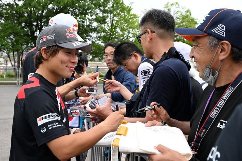 Toyota Gazoo Racing WRT team's Takamoto Katsuta of Japan meets fans during an autograph-signing session of the Rally Japan, the 7th round of the FIA World Rally Championships in Toyota city, Aichi prefecture on May 28, 2026.  Toshifumi KITAMURA / AFP