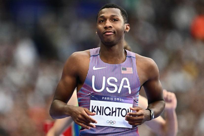 US' Erriyon Knighton reacts after competing in the men's 200m semi-final of the athletics event at the Paris 2024 Olympic Games at Stade de France in Saint-Denis, north of Paris, on August 7, 2024.  Jewel SAMAD / AFP