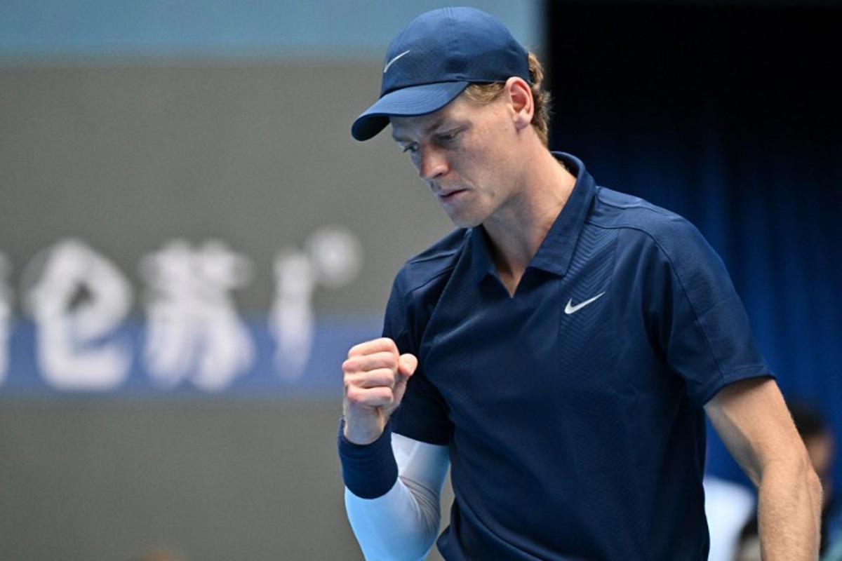 Italy's Jannik Sinner reacts after a point against US' Learner Tien during their men's singles final match at the China Open tennis tournament in Beijing on October 1, 2025.  Pedro Pardo / AFP