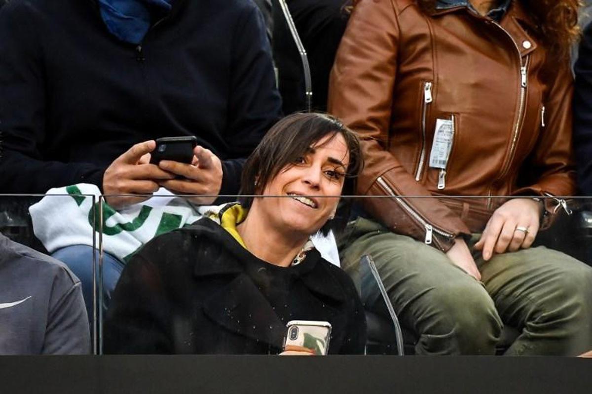 Former italian tennis player Flavia Pennetta, smiles as she looks at her husband Italy's Fabio Fognini playing against France's Jo-Wilfried Tsonga during their ATP Masters tournament tennis match at the Foro Italico in Rome, on May 13, 2019.   Andreas SOLARO / AFP