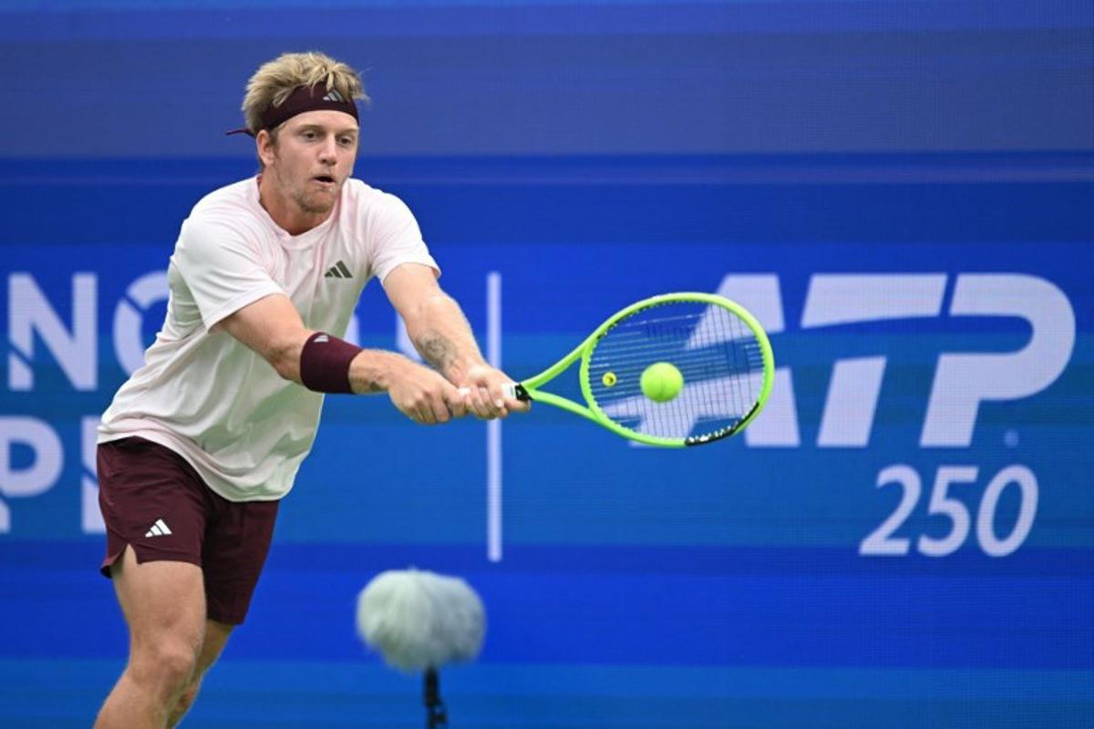 Spain's Alejandro Davidovich Fokina hits a return to Georgia's Nikoloz Basilashvili during their men's singles semi-final match at the Chengdu Open tennis tournament in Chengdu, in China's southwest Sichuan province on September 28, 2026.   STR / AFP