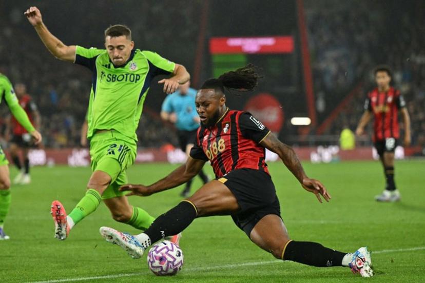 Fulham's Belgian defender #21 Timothy Castagne (L) vies with Bournemouth's Ghanaian striker #24 Antoine Semenyo (R) during the English Premier League football match between Bournemouth and Fulham at the Vitality Stadium in Bournemouth, southern England on October 3, 2025.  Glyn KIRK / AFP