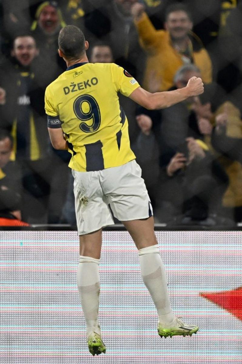 Fenerbahce's Bosnian forward #09 Edin Dzeko celebrates after scoring his team's second goal during the UEFA Europa League knockout phase play-off 1st leg football match between Fenerbahce SK (TUR) and Anderlecht (BEL) at the Sukru Saracoglu Stadium in Istanbul, on February 13, 2025.  Ozan KOSE / AFP