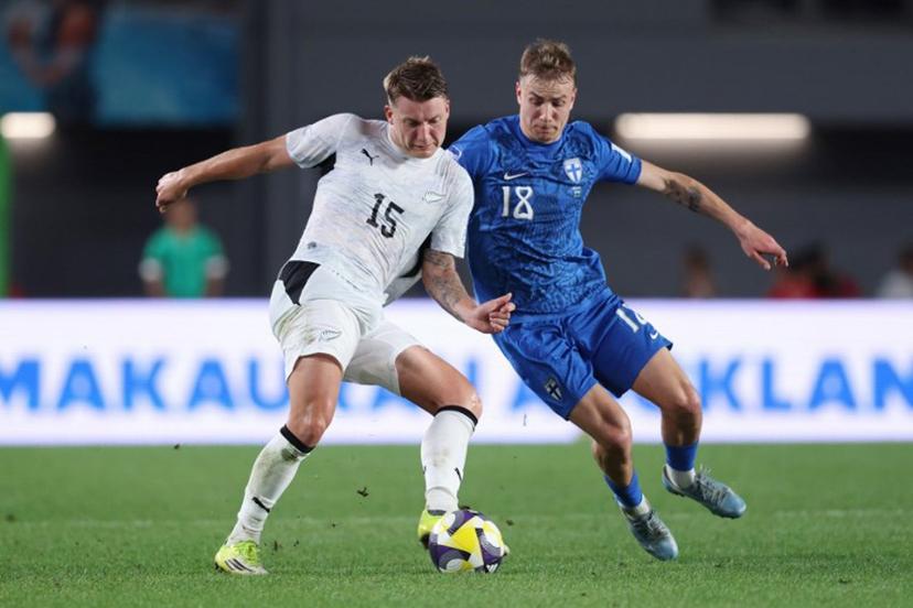 James McGarry of New Zealand (L) competes for the ball with Topi Keskinen of Finland (R) during the international friendly football match between New Zealand and Finland at Eden Park in Auckland on March 27, 2025.  Michael Bradley / AFP