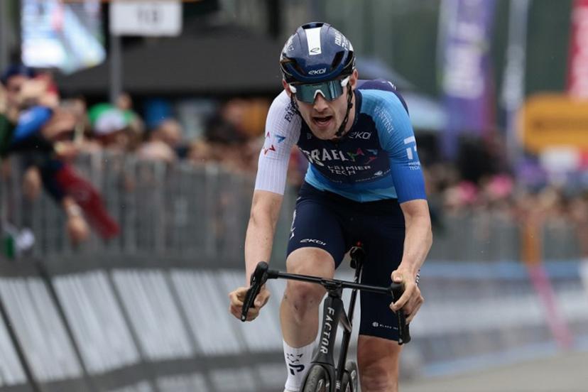 Israel-Premier Tech's Canadian rider Derek Gee crosses the finish line  of the 17th stage of the 108th Giro d'Italia cycling race, 155kms from San Michele all'Adige to Bormio, on May 28, 2025.  Luca Bettini / AFP