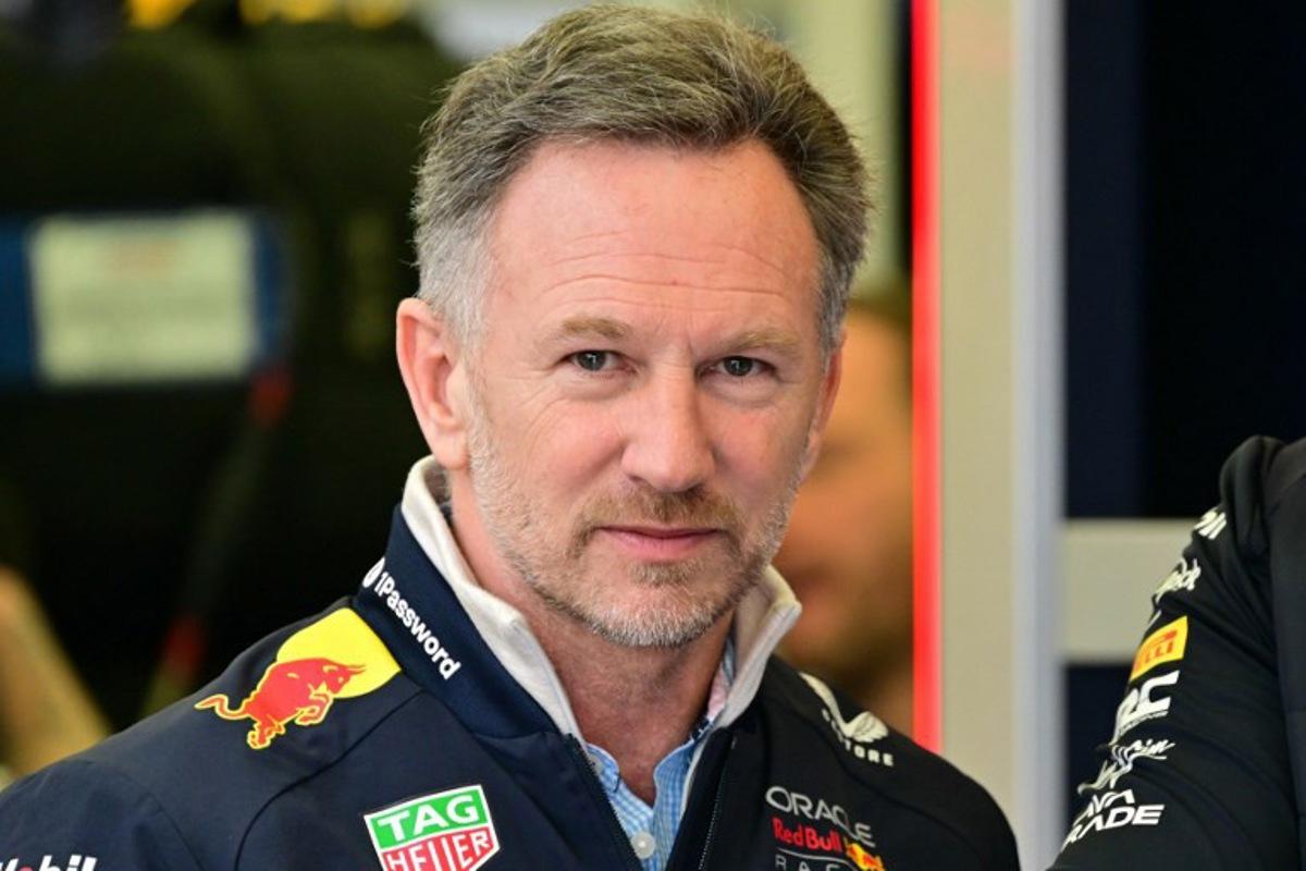 Red Bull Racing team principal Christian Horner looks on as he stands in the garage on the third day of the Formula One pre-season testing at the Bahrain International Circuit in Sakhir on February 28, 2025.  Giuseppe CACACE / AFP