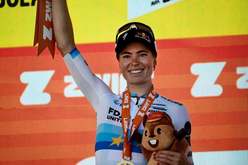 FDJ-SUEZ's Dutch rider Demi Vollering celebrates on the podium after winning the 5th (out of 9) stage of the fifth edition of the Women's Tour de France cycling race, 140 km from Macon to Belleville-en-Beaujolais, in Belleville-en-Beaujolais, central France on August 5, 2026.  NICOLAS TUCAT / AFP