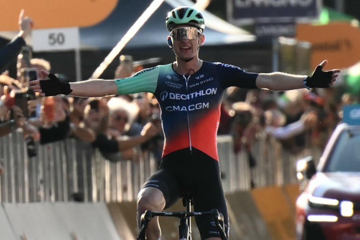 Decathlon CMA CGM Team's French rider Paul Seixas celebrates after winning the 120th edition of the Giro di Lombardia (Tour of Lombardy) between Bergamo and Como on October 10, 2026.  Marco BERTORELLO / AFP