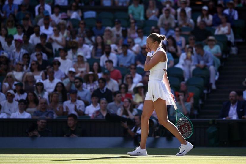 US player Amanda Anisimova reacts as she plays against US player Madison Keys during their women's singles third round tennis match on the sixth day of the 2026 Wimbledon Championships at The All England Lawn Tennis and Croquet Club in Wimbledon, southwest London, on July 4, 2026.  Henry NICHOLLS / AFP
