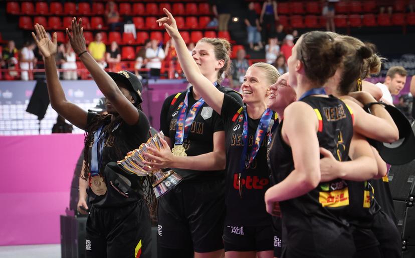 Belgian Cats' players celebrate after winning a basketball match between Spain and Belgian national team 'the Belgian Cats' on Sunday 29 June 2025 in Piraeus, Greece, the final of the FIBA Women's EuroBasket 2025. BELGA PHOTO VIRGINIE LEFOUR