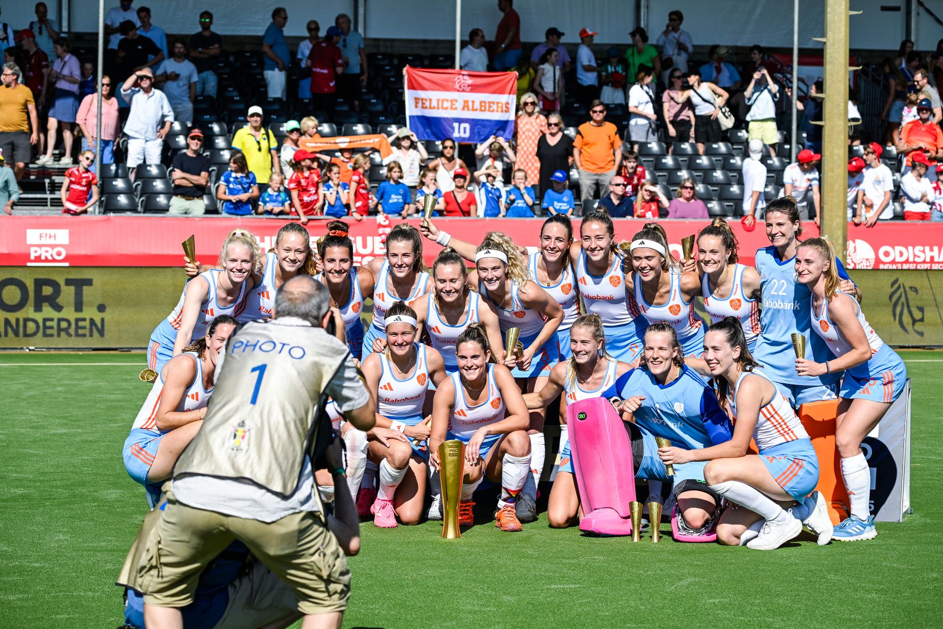 The Netherlands players celebrate with the FIH Trophy after a hockey game between Belgian national team Red Panthers and The Netherlands, match 16/16 in the group stage of the 2025 women's FIH Pro League, Sunday 29 June 2025 in Antwerp. BELGA PHOTO TOM GOYVAERTS