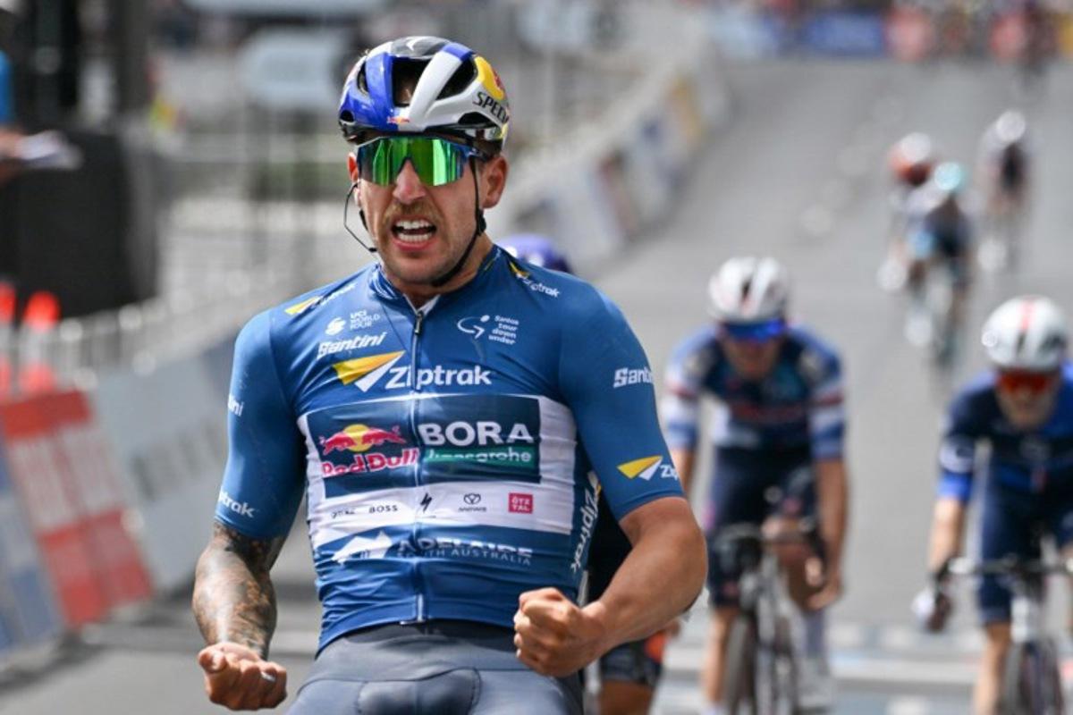 Red Bull-Bora-Hansgrohe rider Sam Welsford from Australia reacts after winning his third stage of the final of the Tour Down Under cycling race in Adelaide on January 26, 2025.  Brenton Edwards / AFP