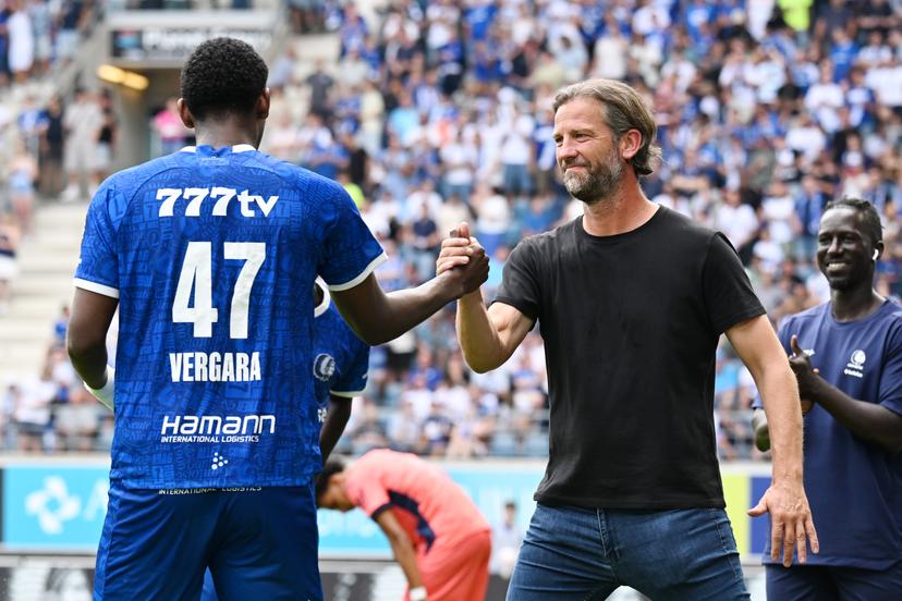 Gent's Josue Yamir Vergara celebrates with Gent's head coach Rik De Mil after scoring the 2-0 goal during a soccer match between KAA Gent and KV Mechelen, Sunday 09 August 2026 in Gent, on day 1 of the 2026-2027 'Jupiler Pro League' first division of the Belgian championship. BELGA PHOTO MAARTEN STRAETEMANS