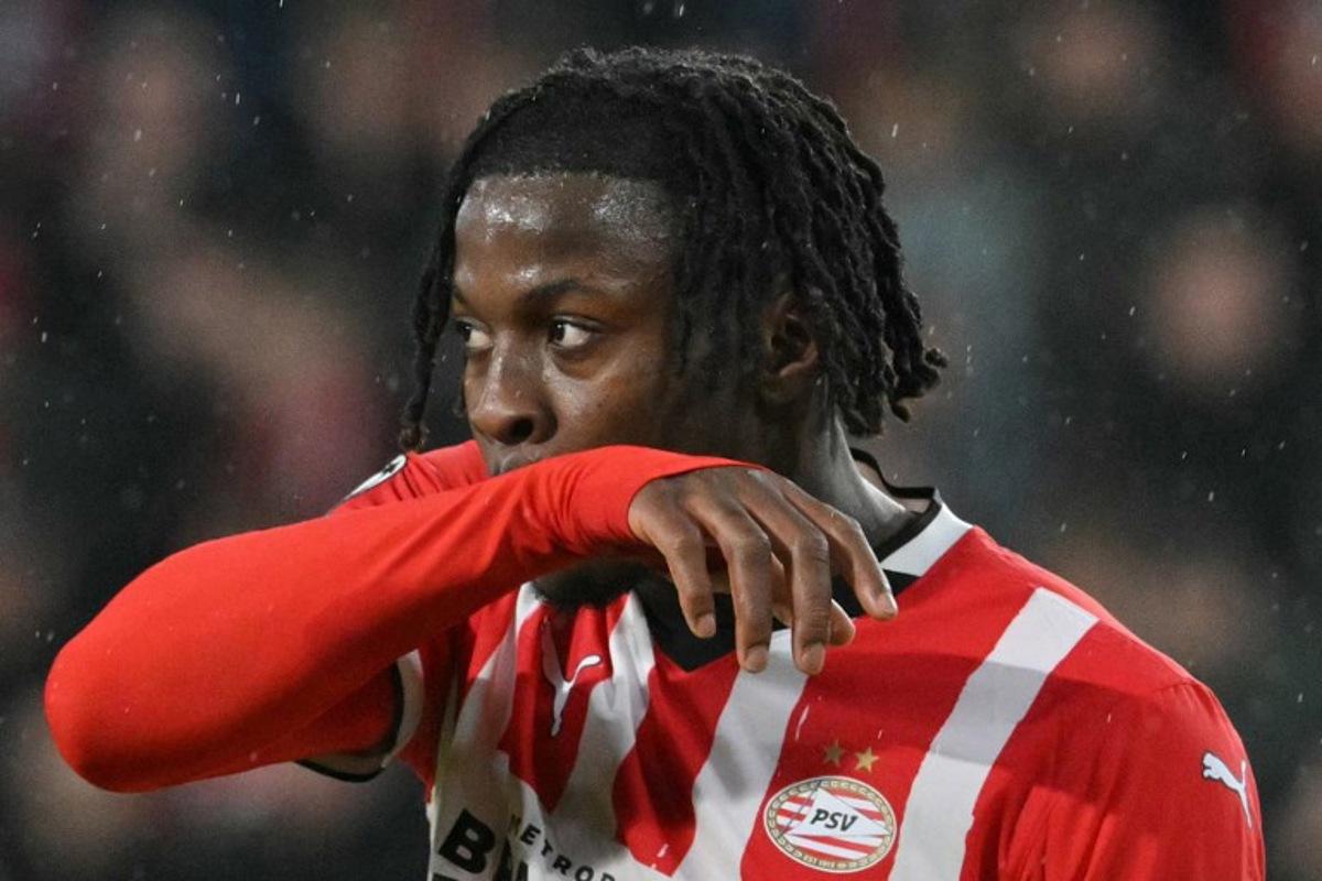 PSV Eindhoven's Belgian forward #11 Johan Bakayoko reacts during the UEFA Champions League, league phase day 8, football match between PSV Eindhoven (NED) and Liverpool FC (ENG) at the the Philips Stadion, in Eindhoven, on January 29, 2025.  NICOLAS TUCAT / AFP