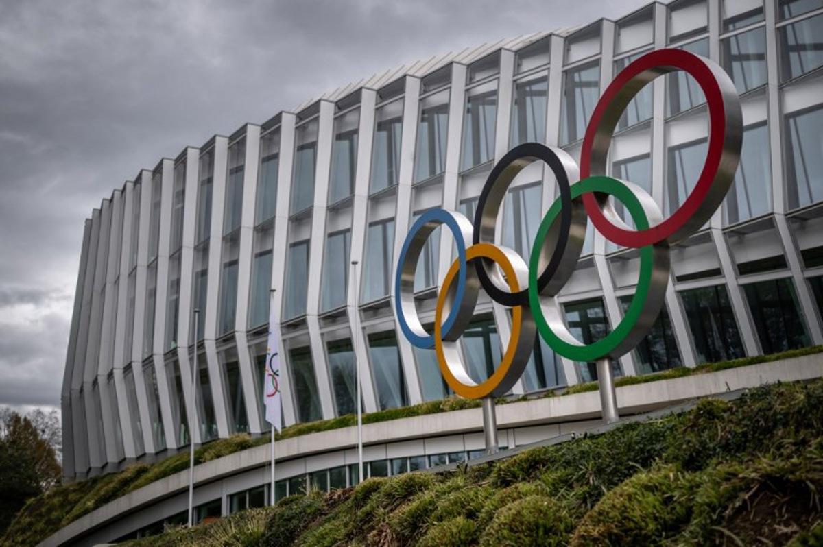 The headquarters of International Olympic Committee (IOC) is seen during a protest against the proposed IOC roadmap to organise the return to competition of Russian athletes under a neutral flag, provided that they have "not actively supported the war in Ukraine" in Lausanne on March 25, 2023.  Fabrice COFFRINI / AFP