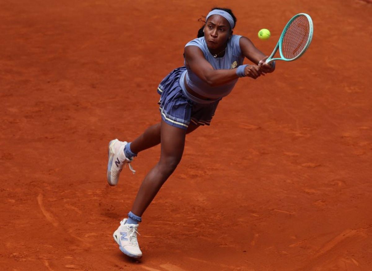 US Coco Gauff returns the ball to Russia's Mirra Andreeva during their 2025 WTA Tour Madrid Open tennis tournament quarter final singles match at the Caja Magica in Madrid, on April 30, 2025.  Pierre-Philippe MARCOU / AFP