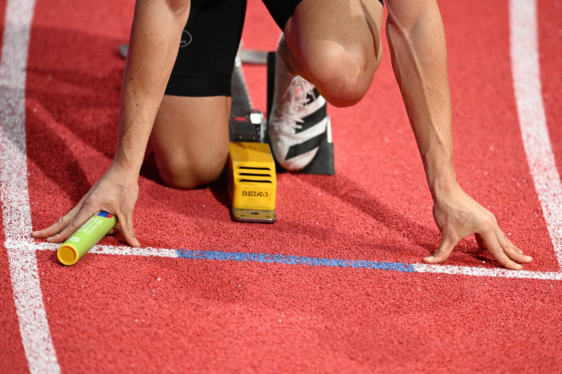 Illustration picture shows the hands of Belgian Julien Watrin, holding the relay baton at the start of the men 4x400m relay heats on the third and last day of the World Athletics Indoor Championships, in Belgrade, Serbia, Sunday 20 March 2022. The championships take place from 18 to 20 March. BELGA PHOTO JASPER JACOBS