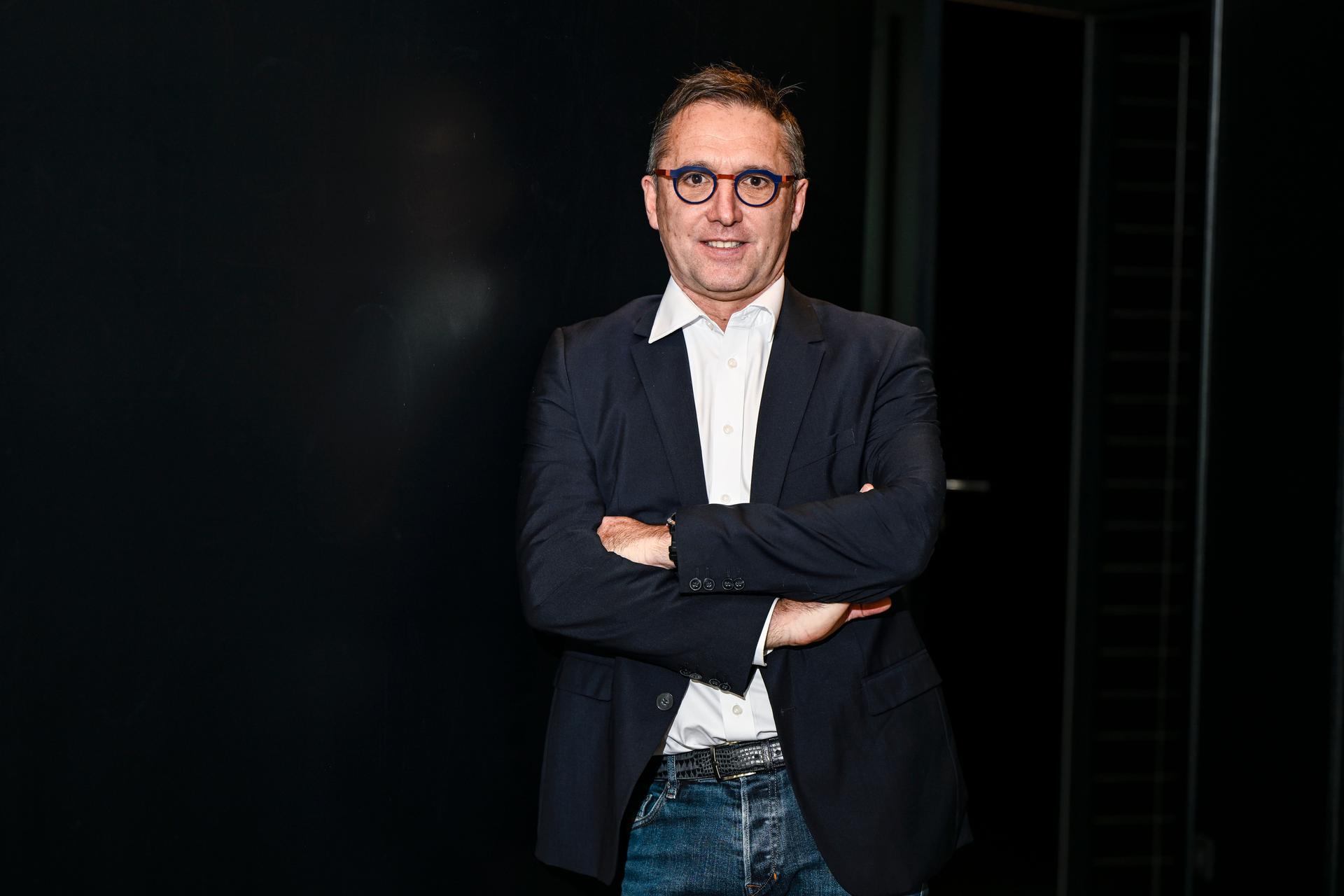 Lotto Dstny CEO Stephane Heulot poses for the photographer during the Lotto Cycling Team media day, in Temse, Friday 03 January 2025. BELGA PHOTO GOYVAERTS