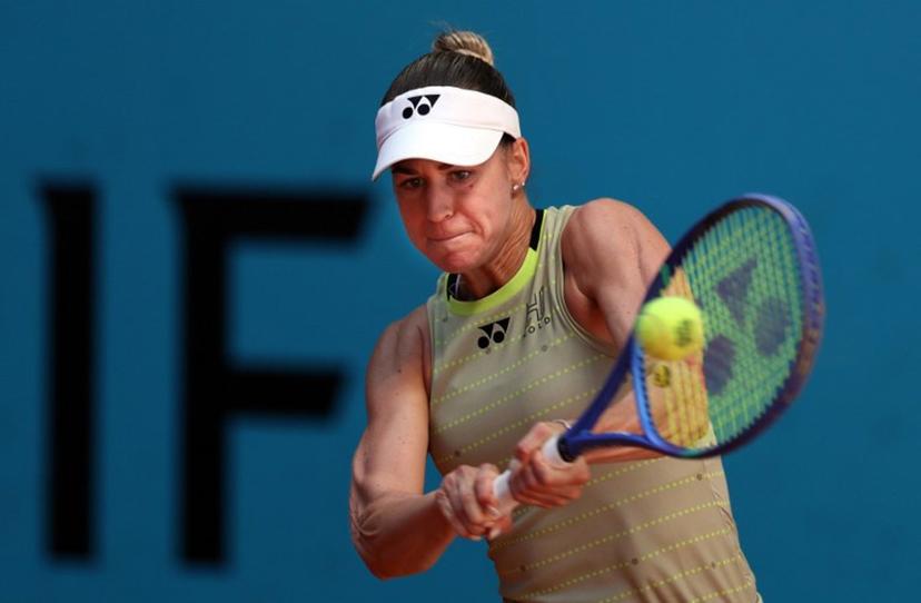 Hungary's Anna Bondar returns the ball to Russia's Mirra Andreeva during their 2026 WTA Tour Madrid Open tennis tournament women's singles match at the Caja Magica in Madrid, on April 27, 2026.   Thomas COEX / AFP