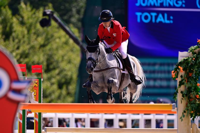 Belgian Tine Magnus and her horse Dia van het Lichterveld Z pictured in action during the final of the Eventing Team Jumping equestrian event at the Chateau de Versailles in Versailles, during the Paris 2024 Olympic Games, on Monday 29 July 2024 in Paris, France. The Games of the XXXIII Olympiad are taking place in Paris from 26 July to 11 August. The Belgian delegation counts 165 athletes competing in 21 sports. BELGA PHOTO LAURIE DIEFFEMBACQ