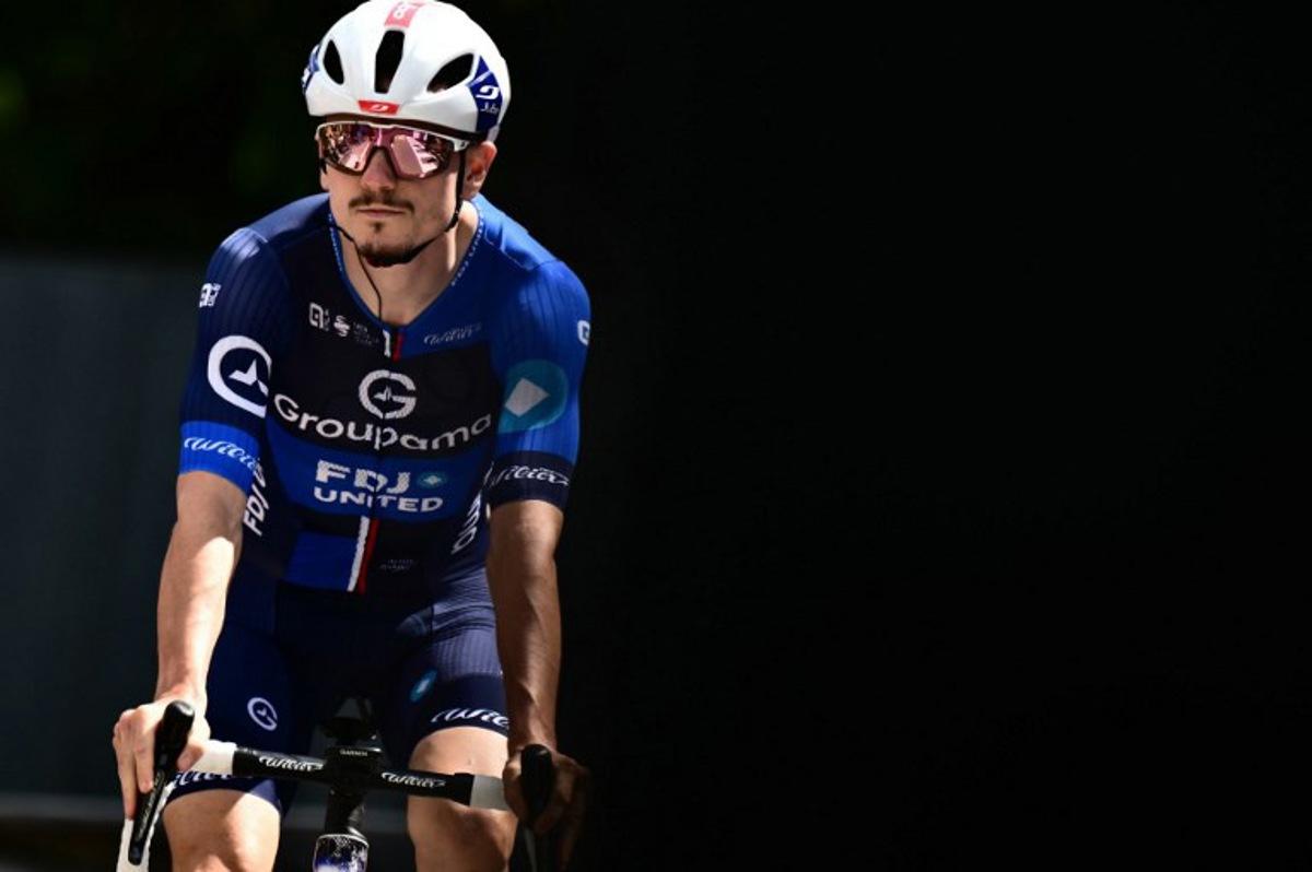 Team Groupama-FDJ's French rider David Gaudu prepares to take the start of the third stage of the Vuelta a Espana, a 134 km race between San Maurizio Canavese and Ceres, in Italy's Piemonte region, on August 25, 2025.    Marco BERTORELLO / AFP