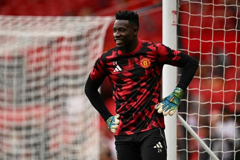 Manchester United's Cameroonian goalkeeper #24 Andre Onana warms up for the English Premier League football match between Manchester United and Burnley at Old Trafford in Manchester, north west England, on August 30, 2025.  Oli SCARFF / AFP