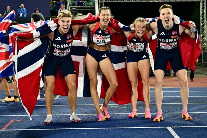 Gold medallists Norway's Andreas Ofstad Kulseng, Norway's Amalie Iuel Norway's Henriette Jaeger and Norway's Karsten Warholm celebrate after competing in the mixed 4x400m relay final during the European Athletics Championships at Alexander Stadium in Birmingham on August 10, 2026.  Ben STANSALL / AFP