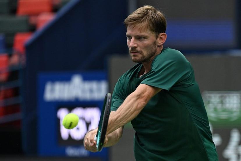 Belgium's David Goffin hits a return to USA's Ben Shelton during their men's singles match at the Shanghai Masters tennis tournament in Shanghai on October 3, 2025.  Jade Gao / AFP