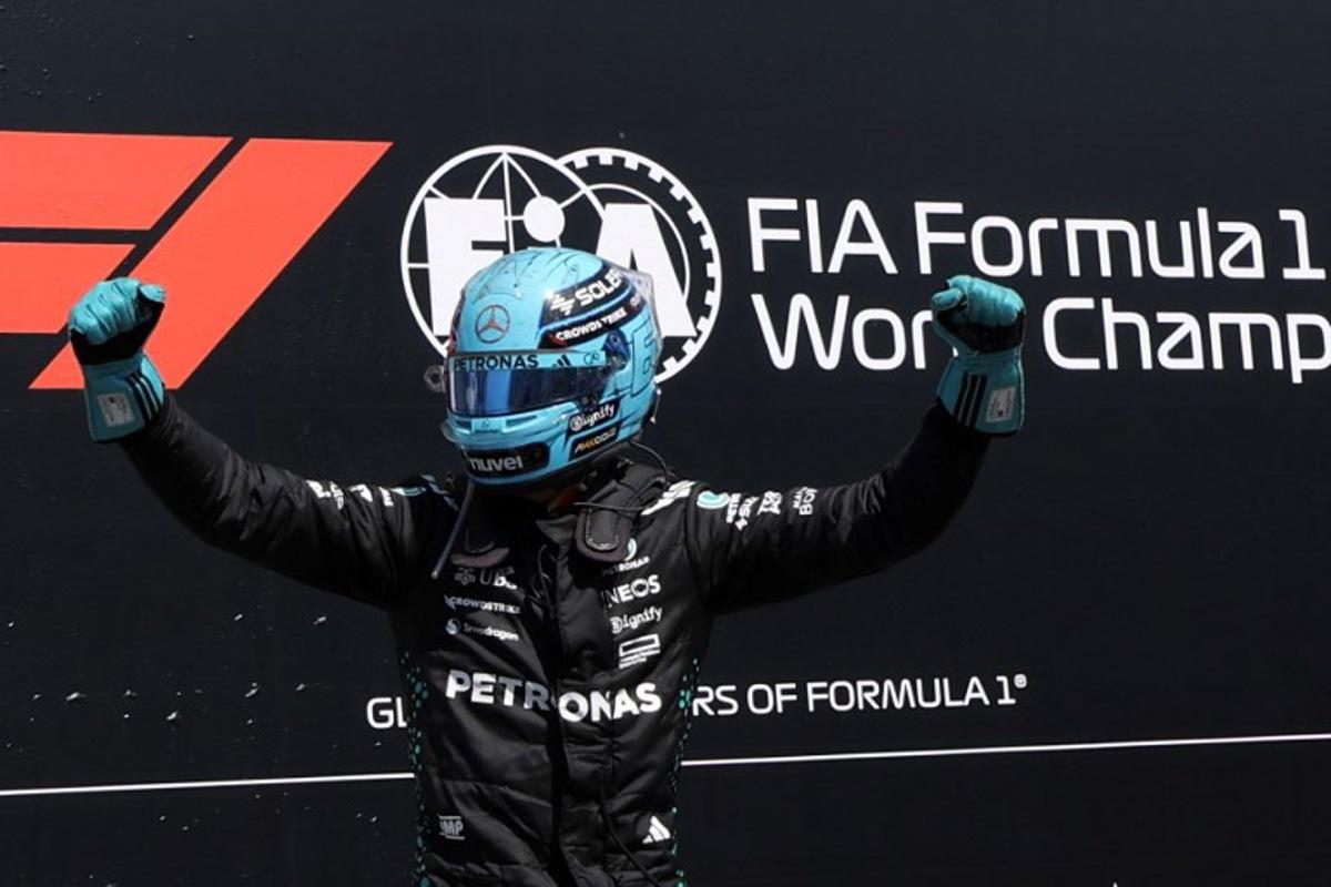 Mercedes' British driver George Russell celebrates after winning the 2025 Formula 1 Grand Prix du Canada at Circuit Gilles-Villeneuve in Montreal, Canada, on June 15, 2025.   TIMOTHY A. CLARY / AFP