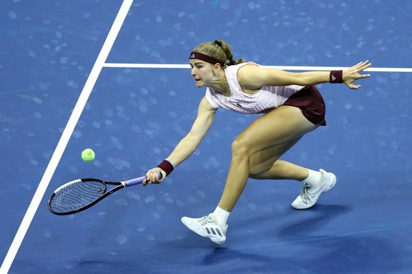 Czech Republic's Karolina Muchova plays a volley during the mixed doubles final tennis match with partner Czech Republic's Jakub Mensik against Switzerland's Belinda Bencic and Italy's Flavio Cobolli of the 2026 US Open tennis tournament at the USTA Billie Jean King National Tennis Center in New York on August 26, 2026.  CHARLY TRIBALLEAU / AFP