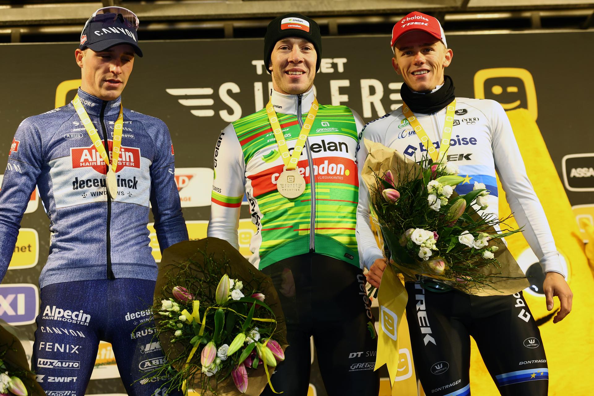 Belgian Niels Vandeputte, Belgian Laurens Sweeck and Belgian Thibau Nys celebrate on the podium after the men elite race of Diegem Cross cyclocross cycling event, Monday 30 December 2024 in Diegem, stage 6/8 in the Superprestige cyclocross cycling competition. BELGA PHOTO DAVID PINTENS