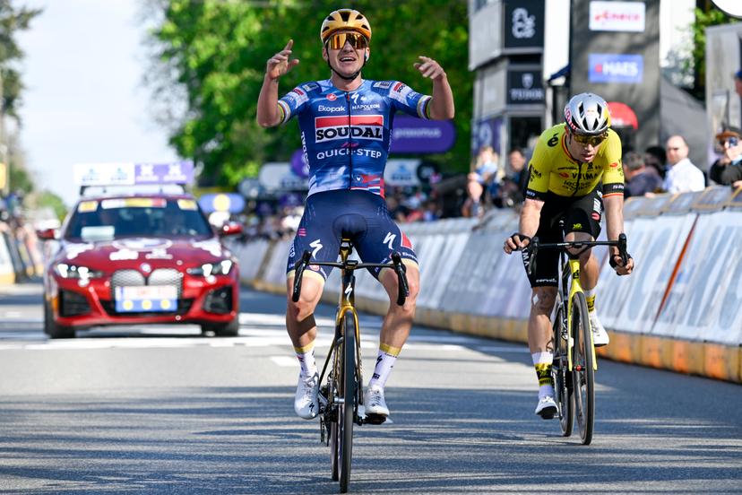 Belgian Remco Evenepoel of Soudal Quick-Step celebrates as he wins before Belgian Wout van Aert of Team Visma-Lease a Bike the men's 'Brabantse Pijl' one day cycling race, 162,5km from Huizingen, Beersel to Overijse on Friday 18 April 2025. BELGA PHOTO TOM GOYVAERTS