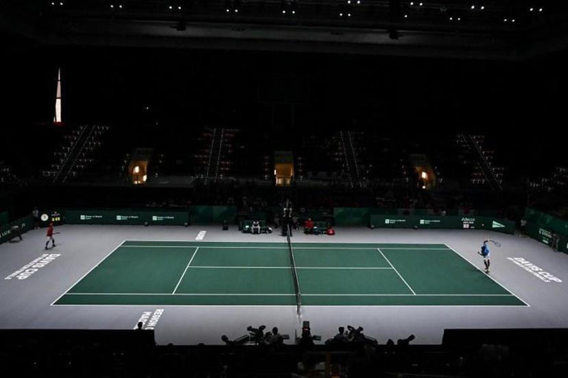 France's Gael Monfils (R) serves the ball to Japan's Yoshihito Nishioka during the singles tennis match between France and Japan at the Davis Cup Madrid Finals 2019 in Madrid on November 19, 2019.   GABRIEL BOUYS / AFP