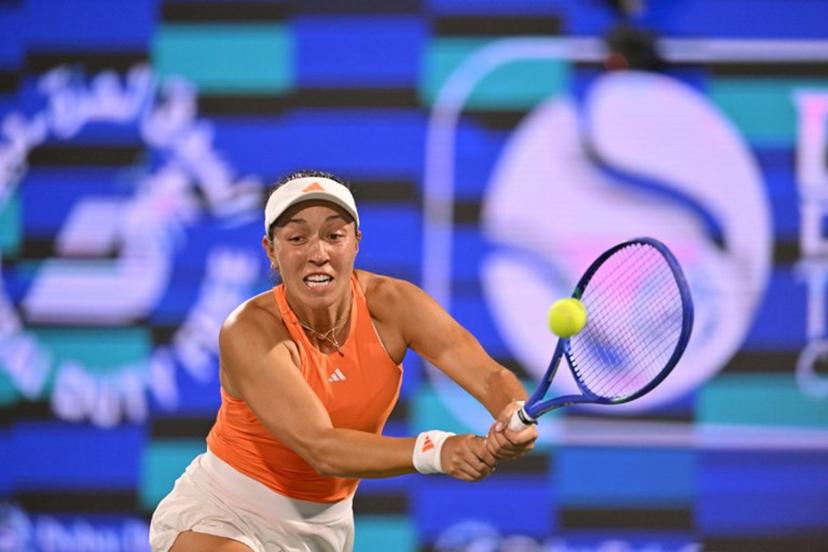 US' Jessica Pegula hits a return against compatriot Amanda Anisimova during their women's singles semi-final match at the Dubai Duty Free Tennis tournament in Dubai on February 20, 2026.  Ryan Lim / AFP