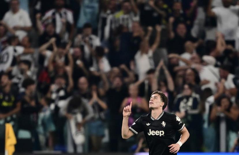 Juventus' Turkish forward #10 Kenan Yildiz celebrates after scoring during the UEFA Champions League first round day 1 football match between Juventus and Borussia Dortmund at the Allianz stadium in Turin, northern Italy, on September 16, 2025.  Marco BERTORELLO / AFP