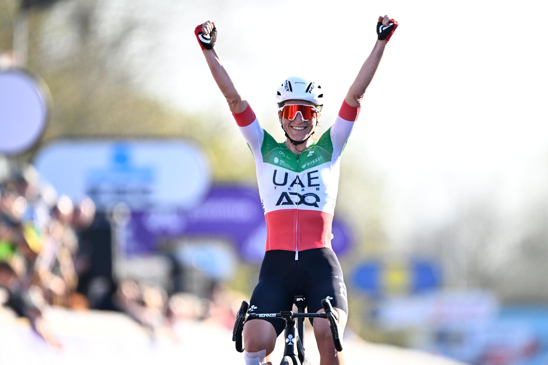 Italian Elisa Longo Borghini of UAE Team ADQ celebrates after winning the women elite race of the 'Dwars Door Vlaanderen' cycling event, 128,5km from and to Waregem, Wednesday 02 April 2025. BELGA PHOTO JASPER JACOBS