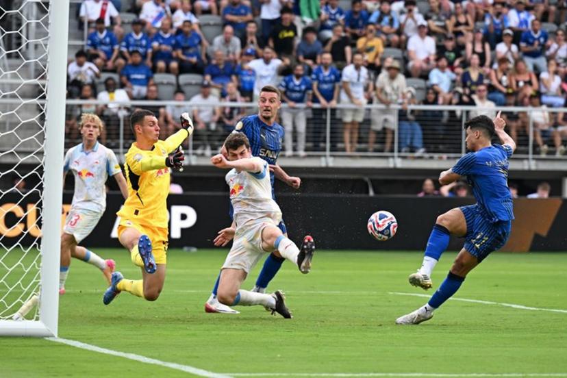 Al Hilal's Brazilian forward #11 Marcos Leonardo (L) shoots but fails to score as Salzburg's Danish defender #02 Jacob Rasmussen (C) stops the ball during the FIFA Club World Cup 2025 Group H football match between Austria's FC Salzburg and Saudi's Al-Hilal at the Audi Field stadium in Washington, DC, on June 22, 2025.  ROBERTO SCHMIDT / AFP