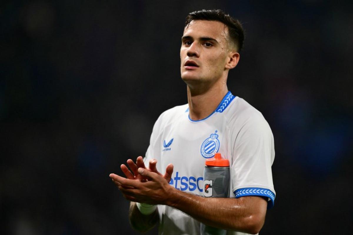 Club Brugge's Serbian midfielder #25 Aleksandar Stankovic looks dejected at the end of the UEFA Champions League phase day 2 football match between Atalanta and Club Brugge at the Gewiss stadium in Bergamo, on September 30, 2025.   Marco BERTORELLO / AFP