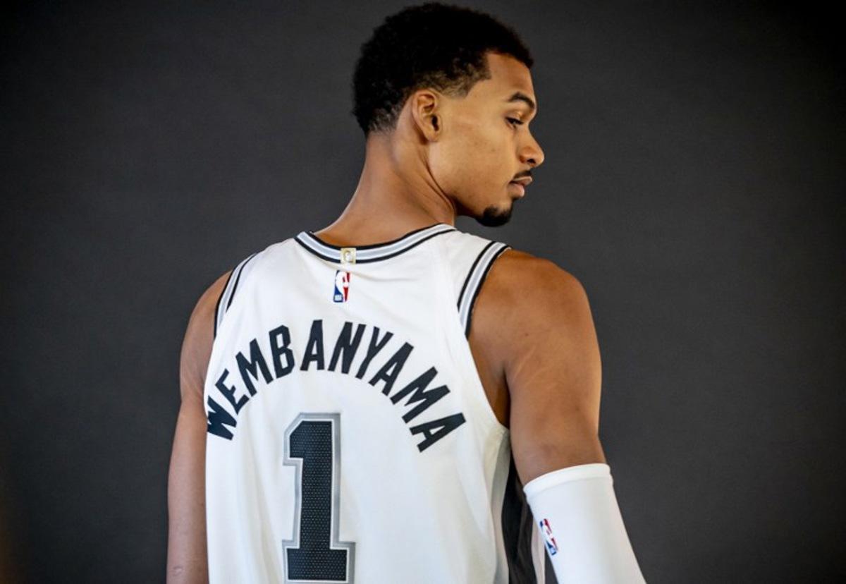 French basketball player Victor Wembanyama poses for promotional photos during the San Antonio Spurs media day at the Victory Capital Performance Center in San Antonio, Texas on September 29, 2025. Wembanyama has been cleared by the team's medical staff to play for the upcoming season. SERGIO FLORES / AFP